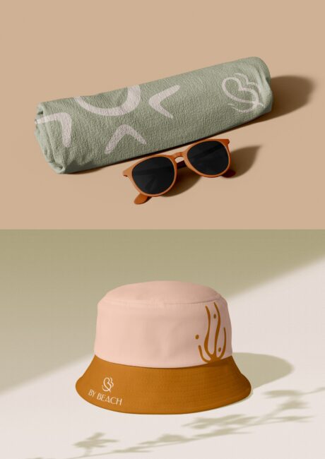 Mockup da identidade visual da By Beach House, chapéu de praia com a marca, por Unpack Design