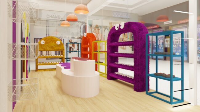 Prateleiras e painéis lúdicos do espaço infantil da Mega Estilo